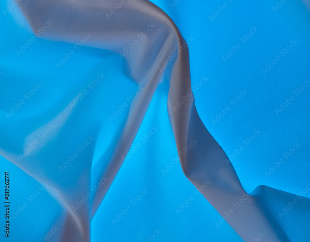 Blue fabric material as an abstract background. Blue fabric material as an abstract background.