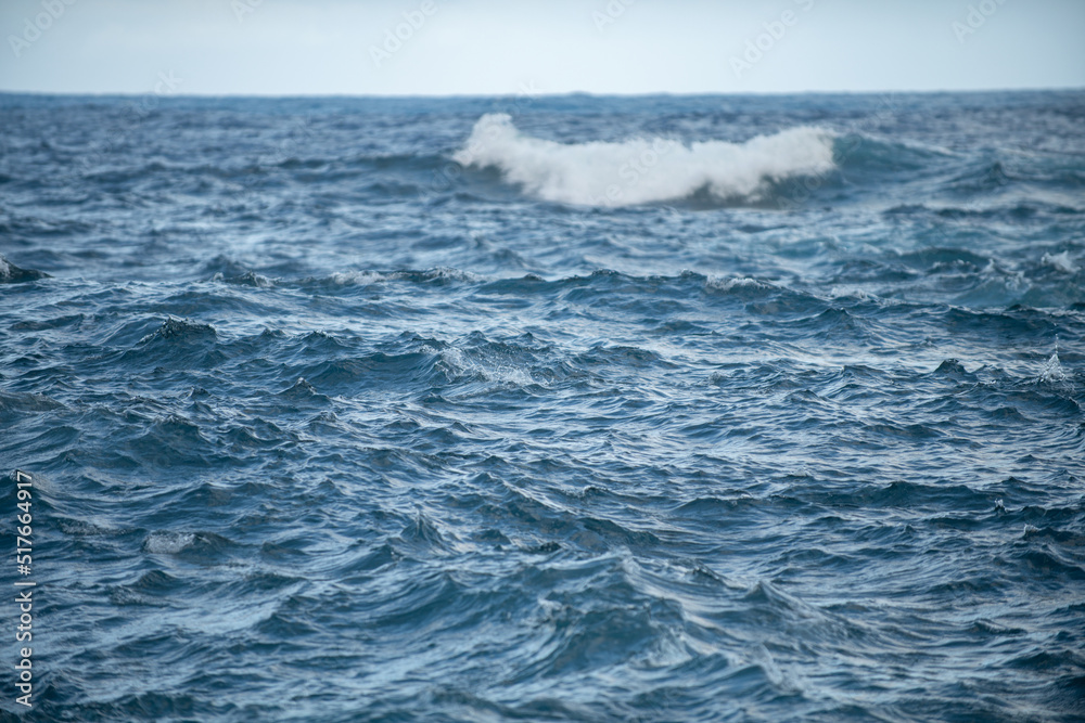 Sea water in rippled water detail background. Ocean waves pattern. Sea water in rippled water detail background. Ocean waves pattern.