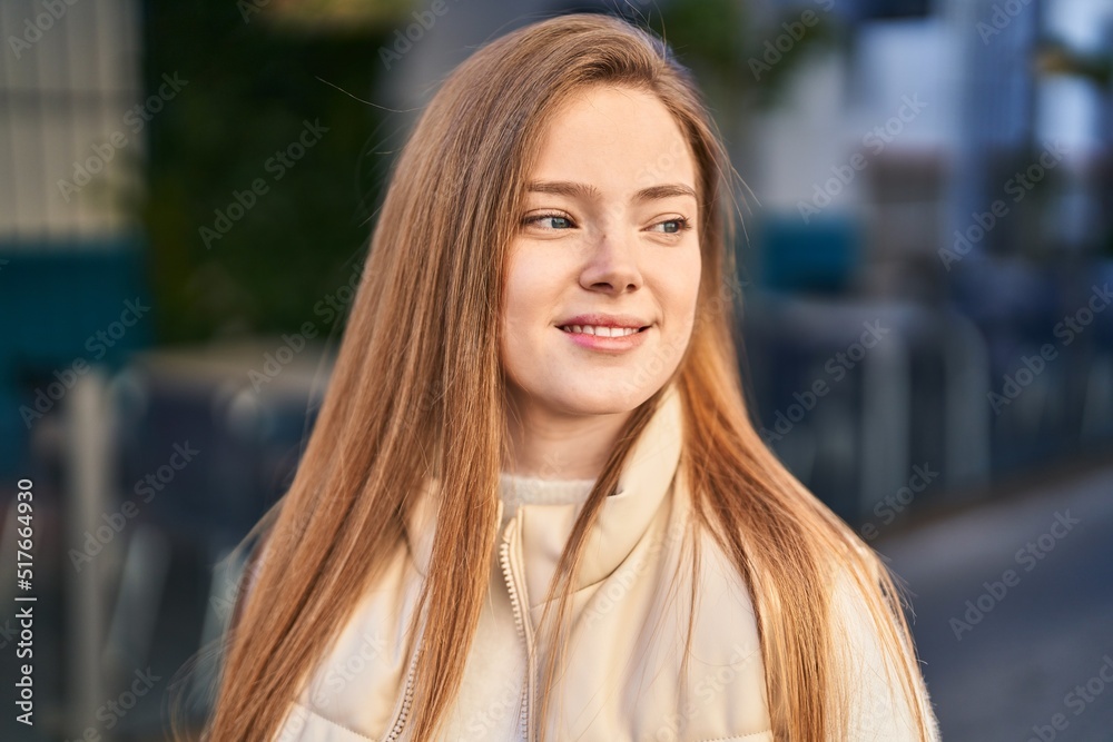 Young blonde woman smiling confident standing at street Young blonde woman smiling confident standing at street