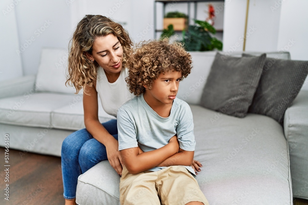 Mother and son arguing at home