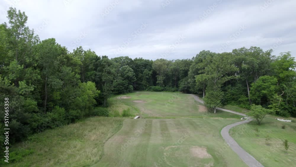 fly over golf course hole, aerial drone rise fly over golf course hole, aerial drone rise