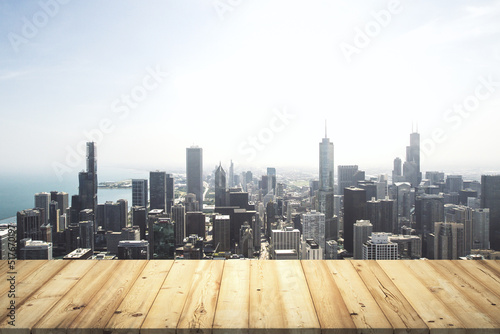Wooden tabletop with beautiful Chicago buildings on background, mock up © Pixels Hunter