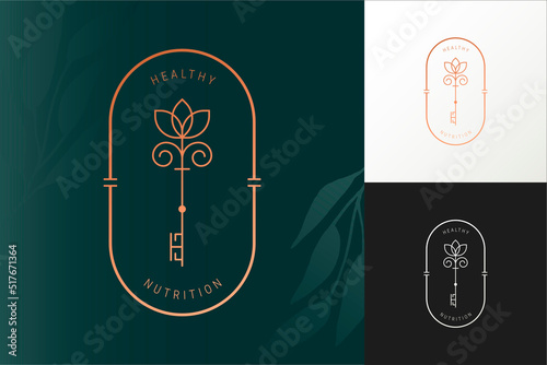 Elegant vector nutrition key oval logo template in two color variations. Art Deco style abstract symbol for cosmetics and packaging, jewellery, hand crafted or beauty products.