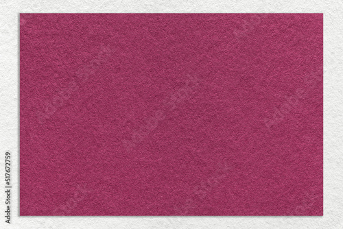 Texture of craft purple color paper background with white border, macro. Structure of vintage dense kraft wine cardboard © nikol85
