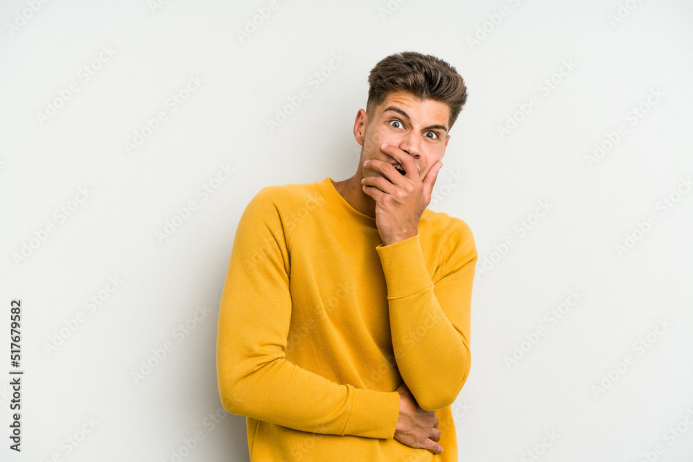 Young caucasian man isolated on white background scared and afraid. Young caucasian man isolated on white background scared and afraid.