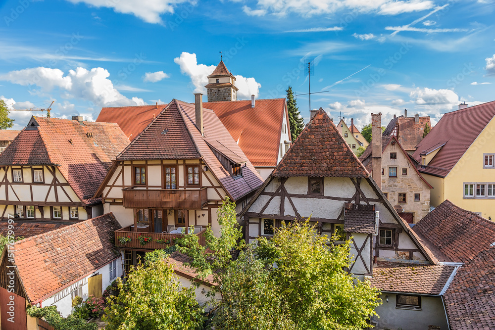 Rothenburg ob der Tauber, Germany. View of the old town with a medieval tower Rothenburg ob der Tauber, Germany. View of the old town with a medieval tower