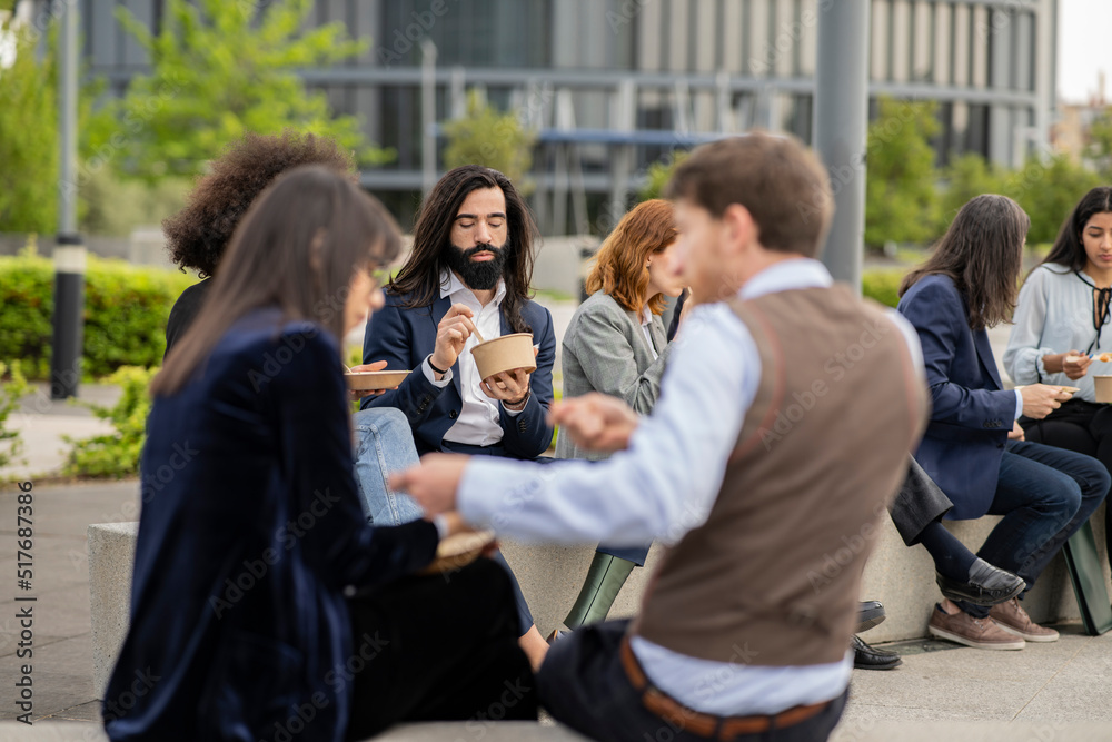 Fototapeta premium business, co-workers at lunch break outside