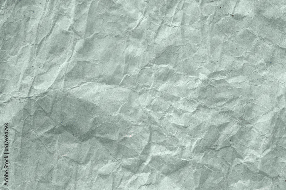 High detail of the abstract texture of the packaging paper. The texture of crumpled craft paper in pastel color. Crumpled paper background top view. The texture of crumpled paper. Space for text. High detail of the abstract texture of the packaging paper. The texture of crumpled craft paper in pastel color. Crumpled paper background top view. The texture of crumpled paper. Space for text.