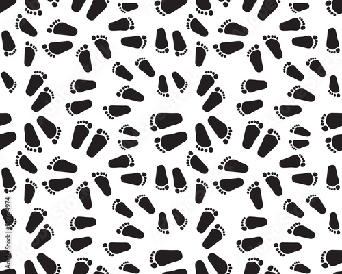 Black prints of baby feet on a white background  seamless pattern