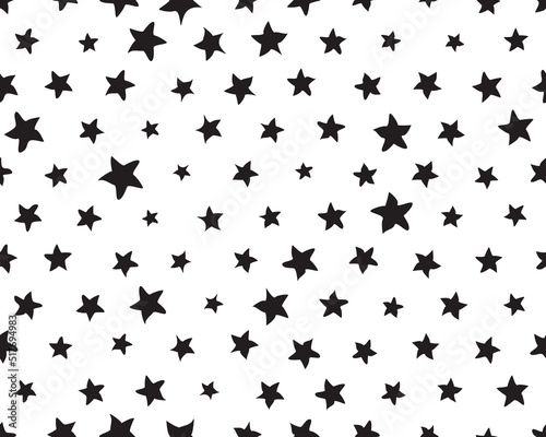 Seamless pattern with black stars on a white background 