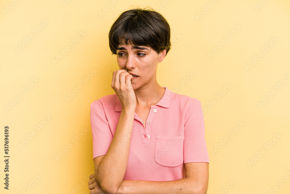 Young caucasian woman with a short hair cut isolated biting fingernails, nervous and very anxious. Young caucasian woman with a short hair cut isolated biting fingernails, nervous and very anxious.