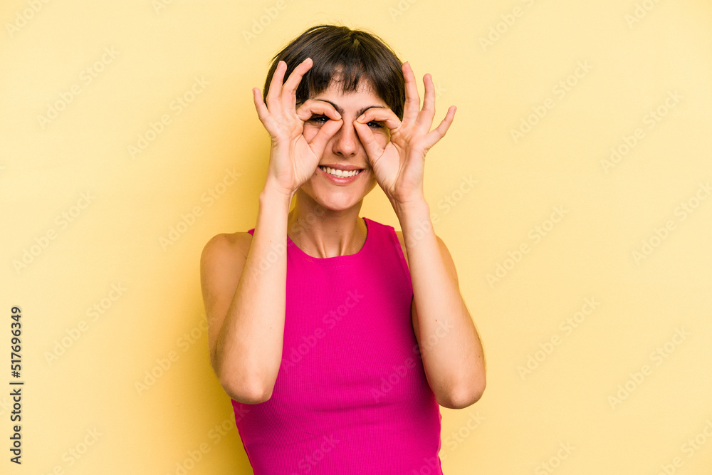 Young caucasian woman with a short hair cut isolated excited keeping ok gesture on eye. Young caucasian woman with a short hair cut isolated excited keeping ok gesture on eye.