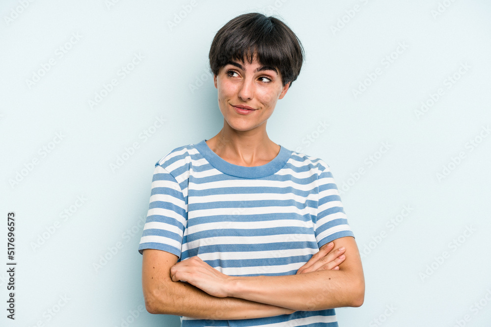 Young caucasian woman with a short hair cut isolated dreaming of achieving goals and purposes