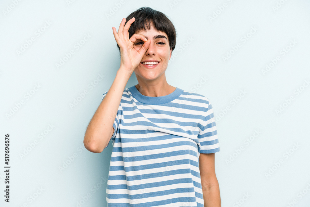 Young caucasian woman with a short hair cut isolated excited keeping ok gesture on eye. Young caucasian woman with a short hair cut isolated excited keeping ok gesture on eye.