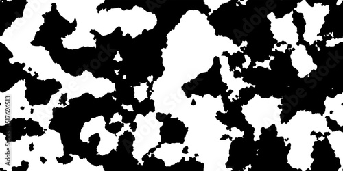 Black cowhide with white spots as a seamless pattern. Spotted vector background. Animal print. Panda  dalmatian or appaloosa horse skin texture.