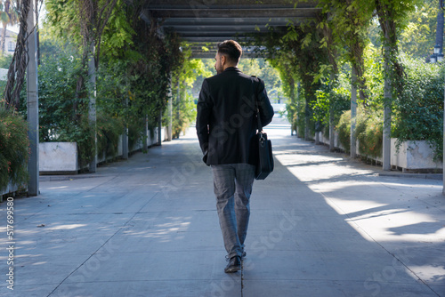 man heading to work. Seviile, Spain. photo