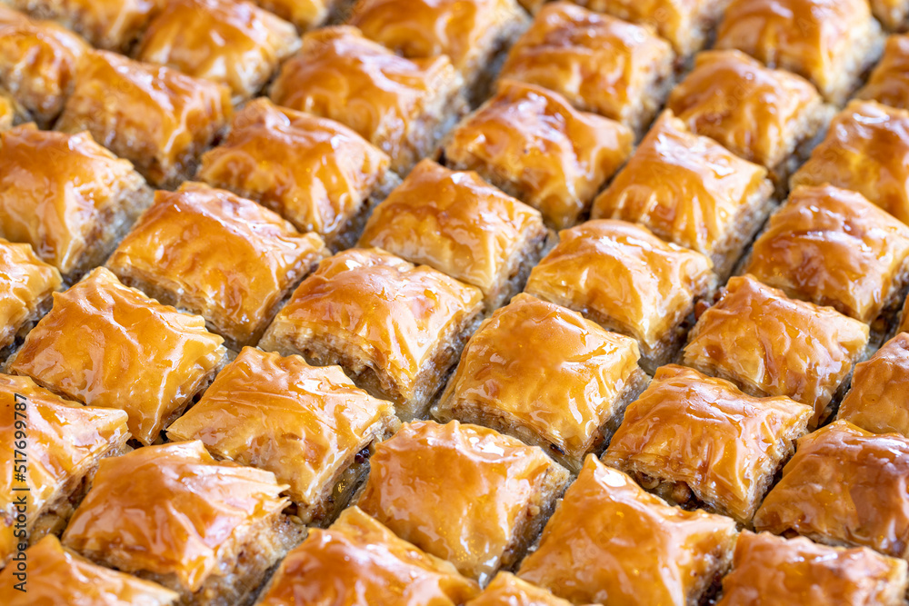 Walnut baklava. Close-up baklava in tray. Turkish cuisine. Walnut baklava. Close-up baklava in tray. Turkish cuisine.