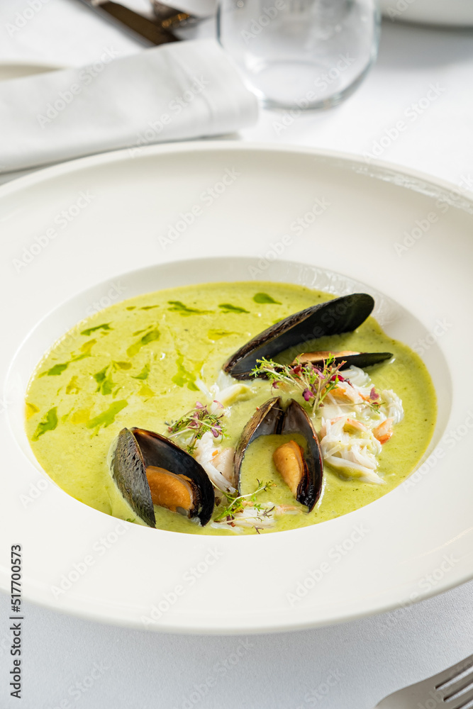 cream soup with mussels and herbs cream soup with mussels and herbs