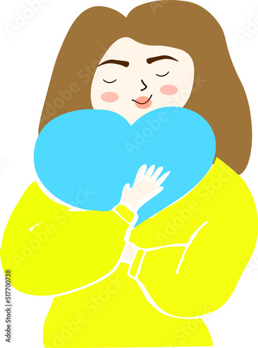 The girl hugs a heart with the colors of the flag of Ukraine. 