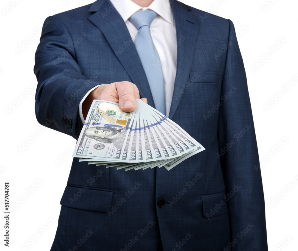 © Alekss - Businessman holding money cash in hands of passing them to the client. © Alekss - Businessman holding money cash in hands of passing them to the client.