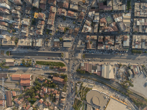 Birds eye view of urban life, buildings and crowded streets