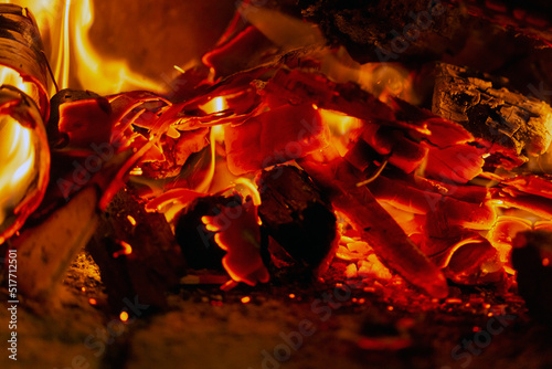 spectacular close-up of embers burning on bonfire