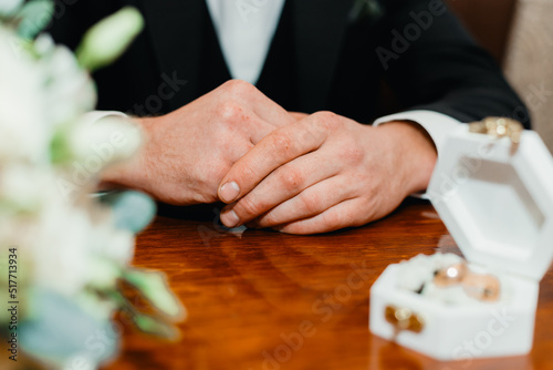 bride and groom holding hands