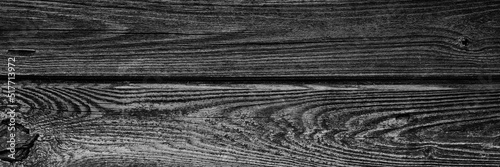 Obraz na plátně the background is tinted in black and grey colour of old wooden boards
