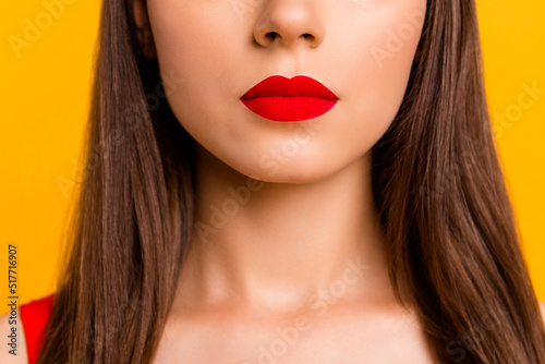 Cropped close up photo of pretty girl nice luxury red lipstick isolated on yellow color background