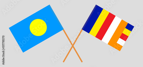 Crossed flags of Palau and Buddhism. Official colors. Correct proportion