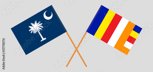 Crossed flags of The State of South Carolina and Buddhism. Official colors. Correct proportion