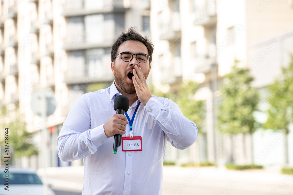journalist smart professional brunette journalist reporting news on television yawning journalist smart professional brunette journalist reporting news on television yawning