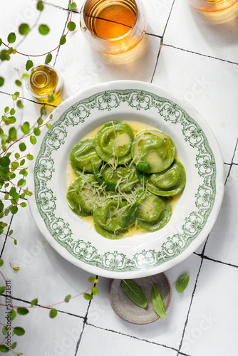green ravioli of spinach dough, stuffed with ricotta and mushrooms