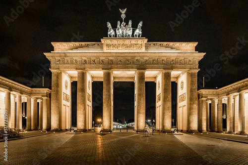 Brandenburg Gate in Berlin, Germany, light up at night casting long shadows from the east side - Flat on