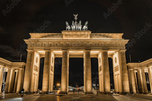 Brandenburg Gate in Berlin, Germany, light up at night casting long shadows from the east side - Front on 