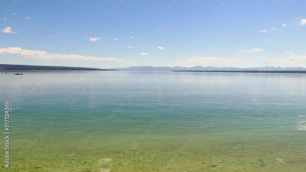People playing Kayak in Yellowstone Lake of Yellowstone National Park People playing Kayak in Yellowstone Lake of Yellowstone National Park