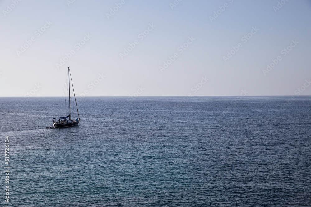 Mallorca, Spain - Boats in a cove in the mediterranean sea blue green color