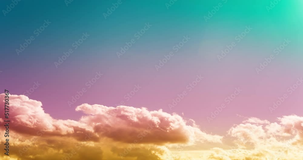 Majestic colorful light of nature sunrise cloudscape view. Stunning 4K timelapse of fast moving fluffy clouds. Fantastic sky texture.
