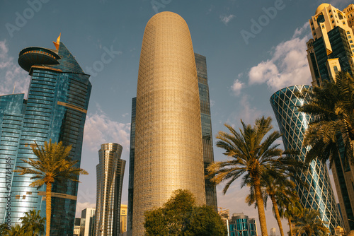 Modern skyscrapers against cloudy sky