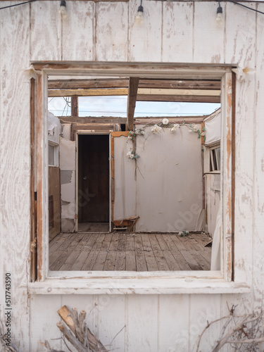 Grungy room of roofless house photo