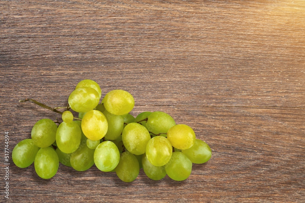 Green tasty sweet muscat grapes on background Green tasty sweet muscat grapes on background