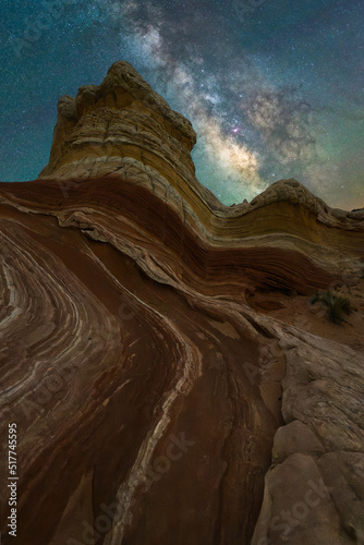 Stone on mountain with milky way on sky