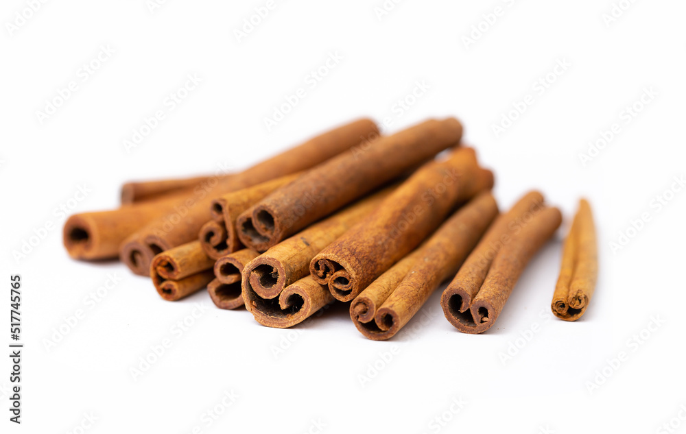 Cinnamon sticks on white background isolated. Indian spices close up. Medicinal herbs and spices.