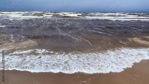 Baltic Sea Waves During a Storm. Bad Weather Cyclone Hurricane Wind. Riga, Latvia. photo