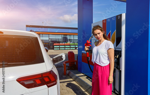 girl is upset about gasoline prices photo
