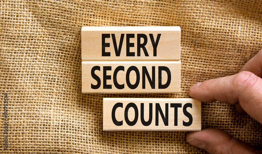Every second counts symbol. Concept words Every second counts on wooden blocks on a beautiful canvas table canvas background. Businessman hand. Business, motivational and every second counts concept. - obrazy, fototapety, plakaty 