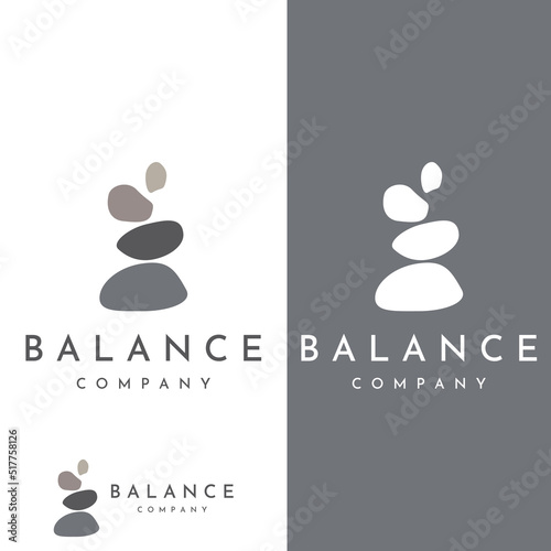 Minimalist zen stones logo, balancing stones, neatly stacked stones, stones for meditation or wellness.With template vector illustration.