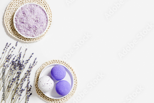 Natural lavender bath bombs and sea salt with essential oil, spa products with dried lavender flowers. Natural cosmetic for beauty treatment and body care, herbal medicine