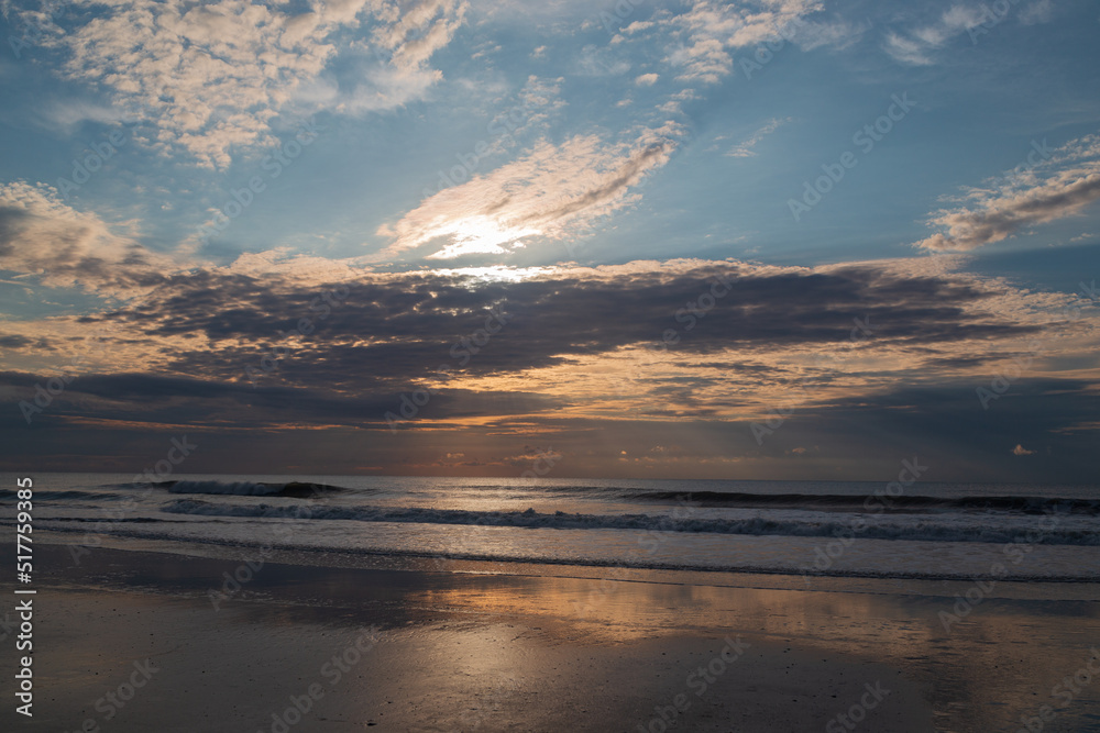 Bold sunrise on Fernandina Beach on Amelia Island after the storm.