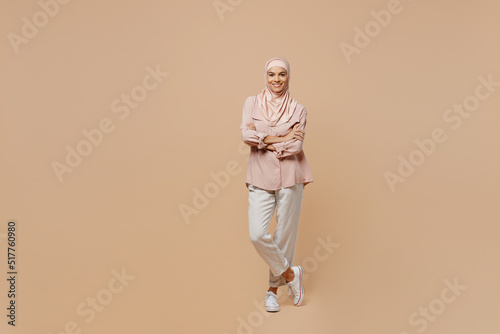 Canvas Print Full body young arabian asian muslim woman she in abaya hijab pink clothes hold